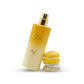 Clean product photography of the Arabiyat Sugar Vanilla Cream Macaron perfume bottle from image_5131c8.jpg. The tall gradient bottle is standing at a 45-degree angle with its gold spray nozzle exposed, and the yellow macaron cap is arranged neatly next to its base. Seamless pure white background (#FFFFFF) with a very soft, realistic light grey shadow underneath to anchor both elements. Minimalist catalog style. Aspect ratio 1:1, size 1200x1200px. (gemini-3-pro-image-preview)