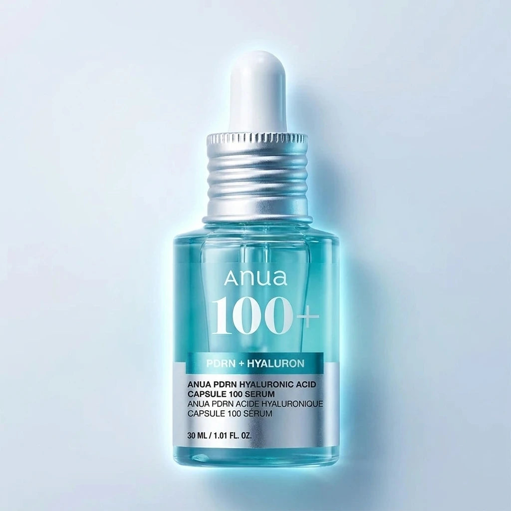 Premium commercial studio shot of the Anua PDRN Hyaluronic Acid Serum bottle. Front-facing view, perfectly centered. Clean, futuristic lighting that highlights the sleek metallic and clear packaging. The text "Anua" and "PDRN Hyaluronic" is crisp, sharp, and perfectly legible. Deep hydration concept, luxury skincare branding. Aspect ratio 1:1, size 1200x1200px. (gemini-3-pro-image-preview)